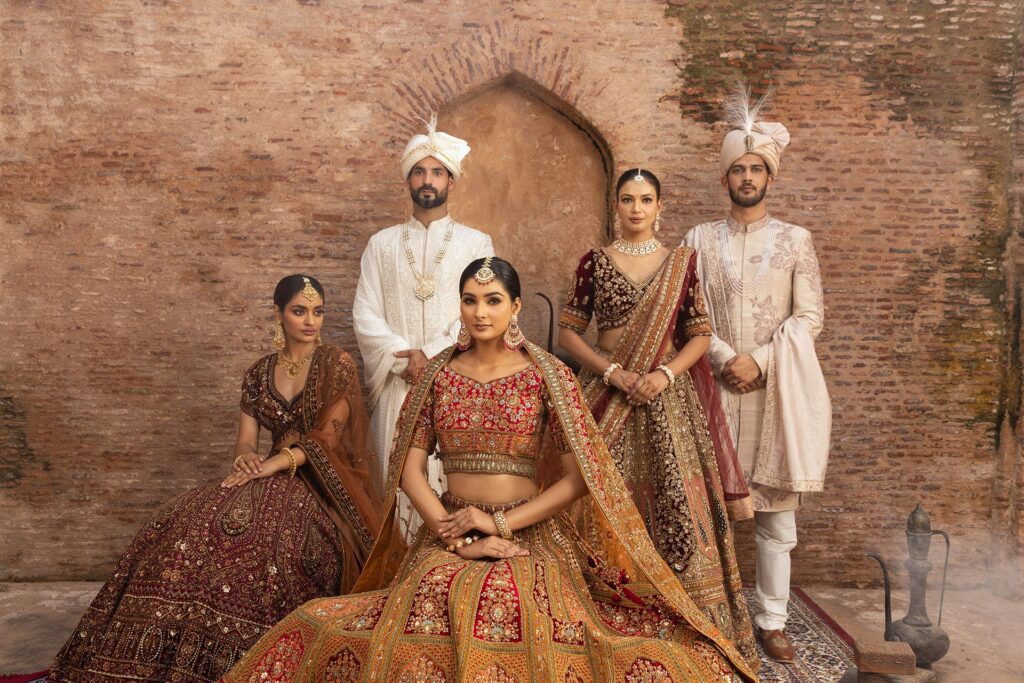 The couple impressed with elegant traditional bridal and groom outfits.