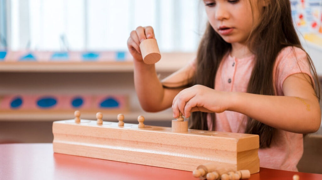 Montessori works by promoting child-led learning, peer mentoring, hands-on activities, and social-emotional growth.