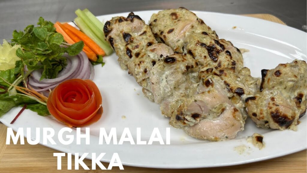 Tender, creamy chicken tikka with mild spices.
