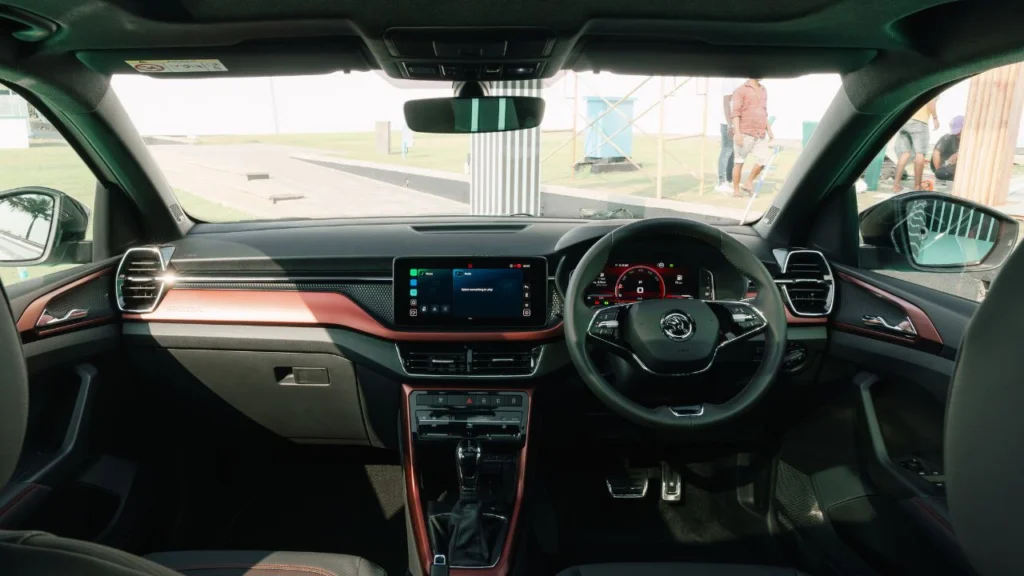 Skoda Kushaq Monte Carlo vs Prestige interior design highlighting sporty and luxury cabin themes